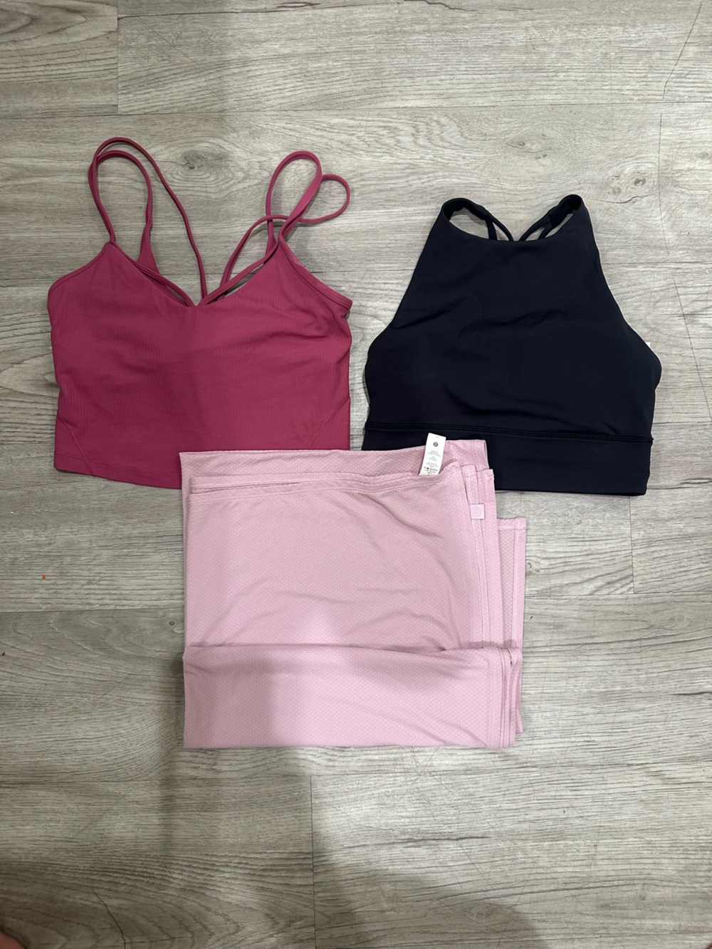 lululemon athletica Pink & Black Strappy Bralettes with Light Pink Leggings